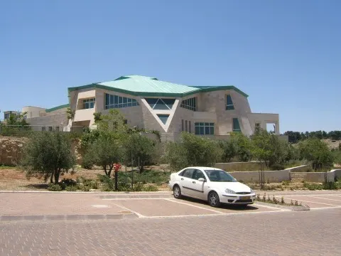 The Migdal Oz building in Gush Etzion, with a green roof